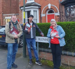 Cllr Jenkins and volunteers delivering leaflets.